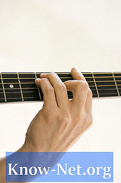 Kā noņemt Rickenbacker ģitāra rokas skalu