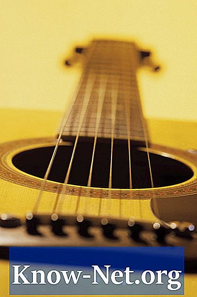 Як визначити розташування моста на гітарі
