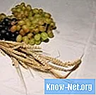 Hva betyr hvete med druer i en blomsteroppsats