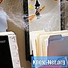 Cara membuat jaring labah-labah palsu dengan kapas